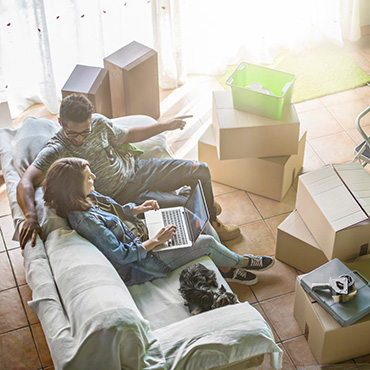 A couple moving into a new home