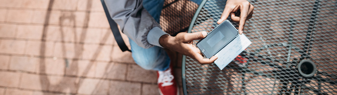 Man making a remote deposit with a smartphone